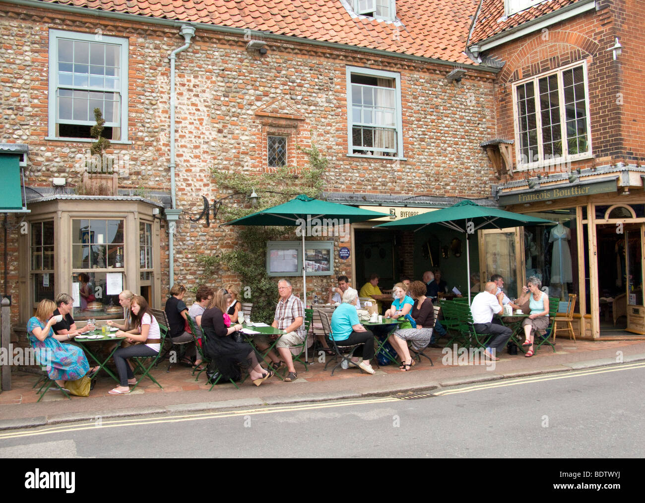 People sat outside eating lunch, Holt Stock Photo