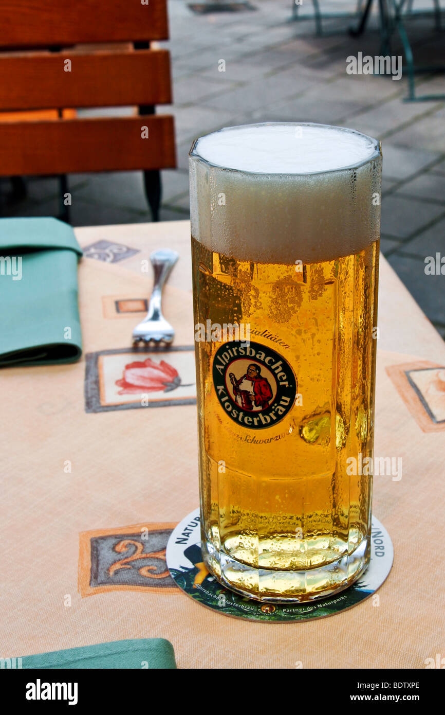 A stein of lager on a table in a restaurant in Ihringen Stock Photo