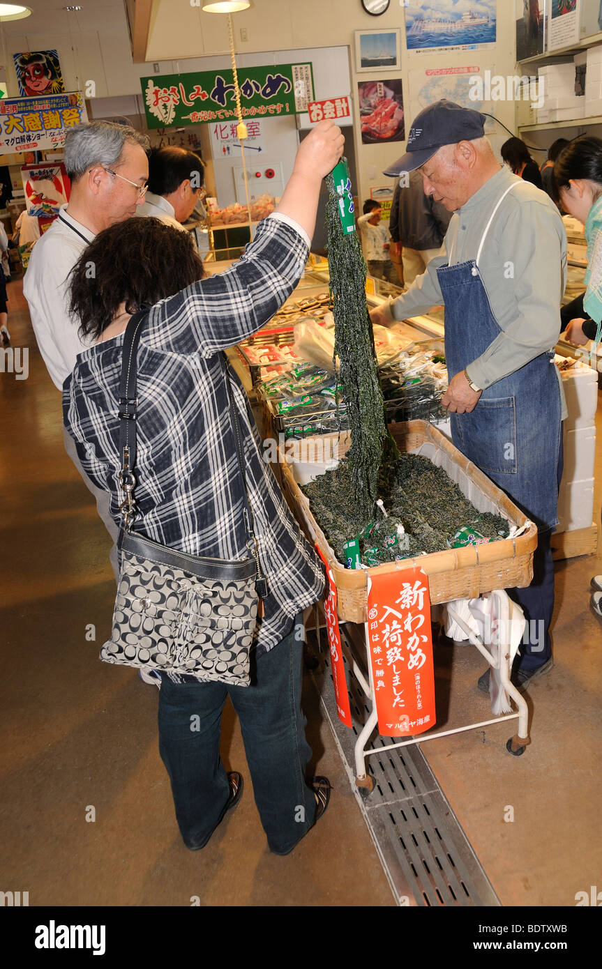 People buying Nori, seaweed, for Japanese food, in a large market for fresh seafood, at the fishing port, Omaezaki, Shizuoka Pr Stock Photo