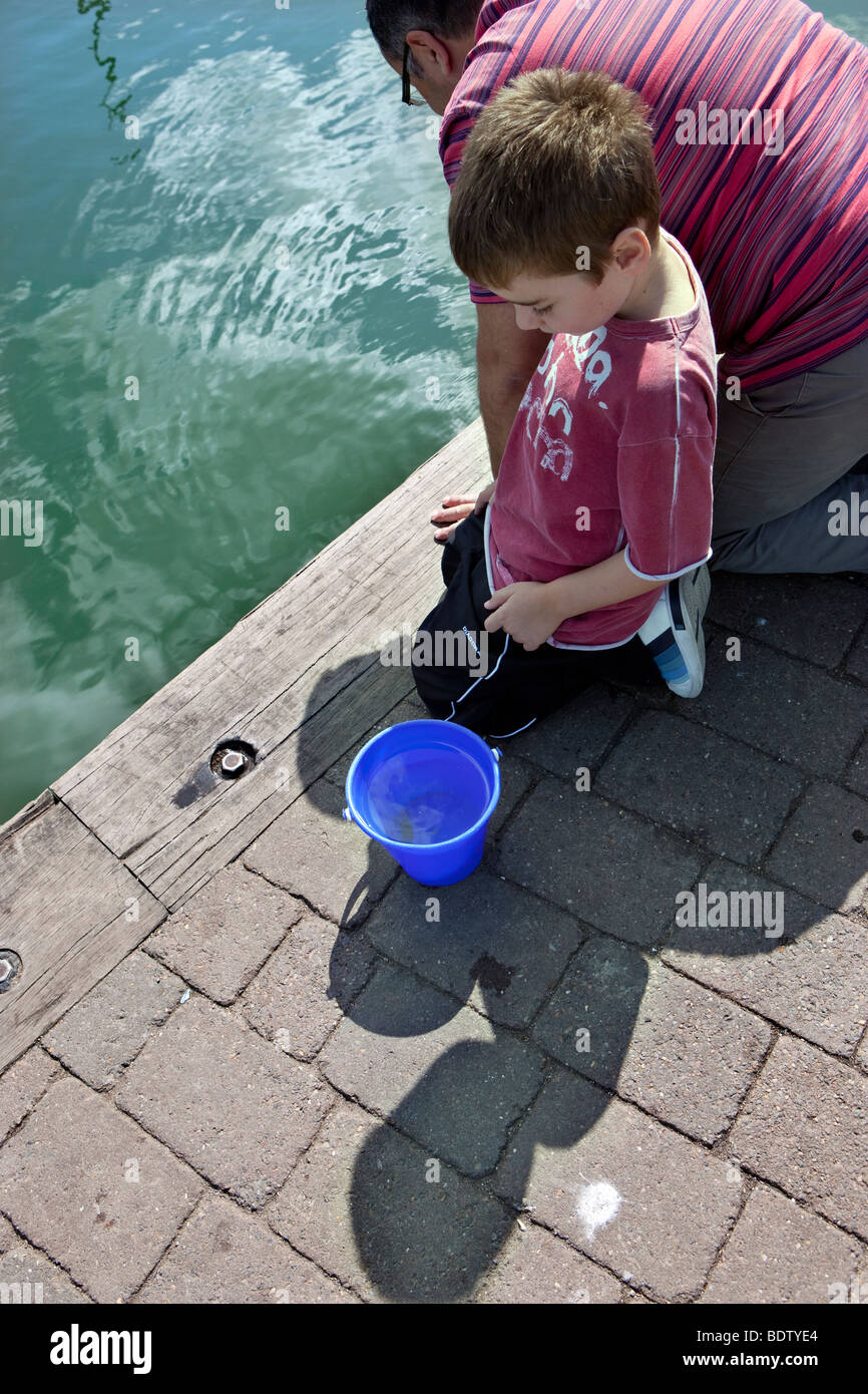 Crab fishing from Lymington Harbour, Hampshire, England Stock Photo Alamy