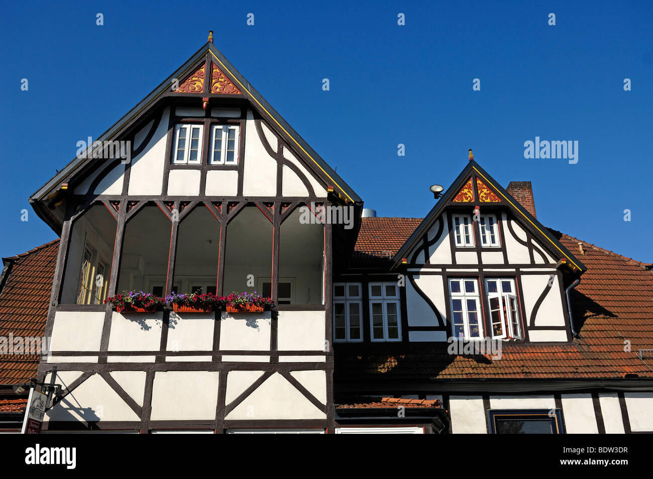 Old Lower Saxony half-timbered gable with veranda, Bad Essen, Lower Saxony, Germany, Europe Stock Photo