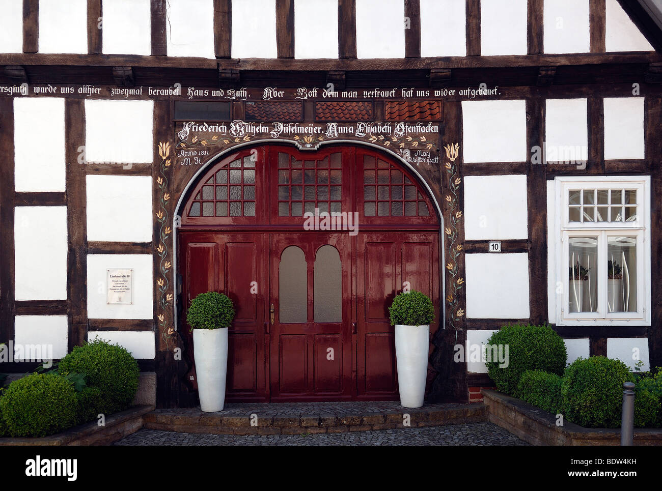 Gate of a Lower Saxony half-timbered house from 1811 with inscriptions, Bad Essen, Lower Saxony, Germany, Europe Stock Photo