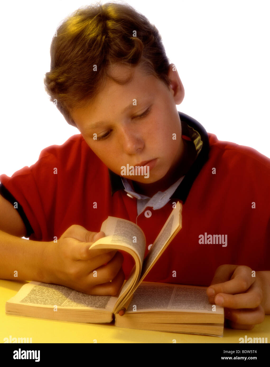 Teenager boy with books Stock Photo