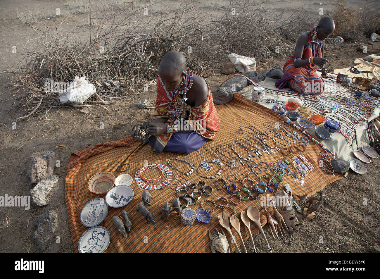 KENYA Masai woman selling traditional handicrafts, Amboseli. Photo by
