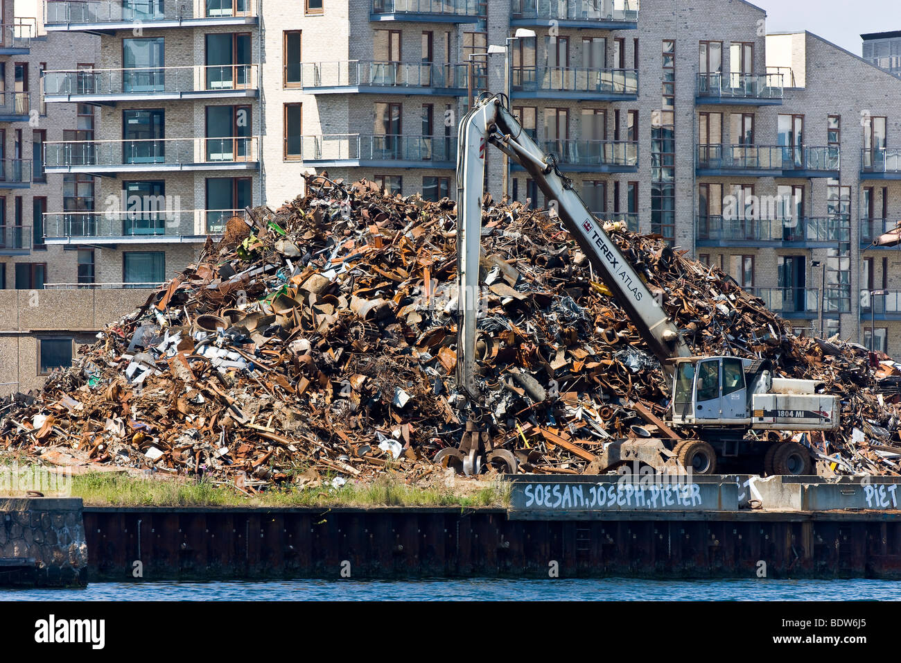 Heap of metal scrap in Copenhagen harbour Stock Photo