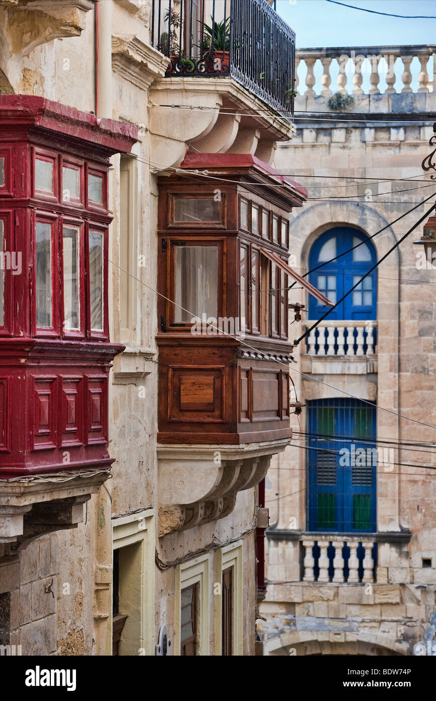 street intersection with typical buildings, shutters, windows in