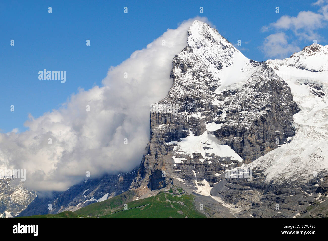 A cloud clings to the north wall of Mt. Eiger, Canton Bern, Switzerland, Europe Stock Photo