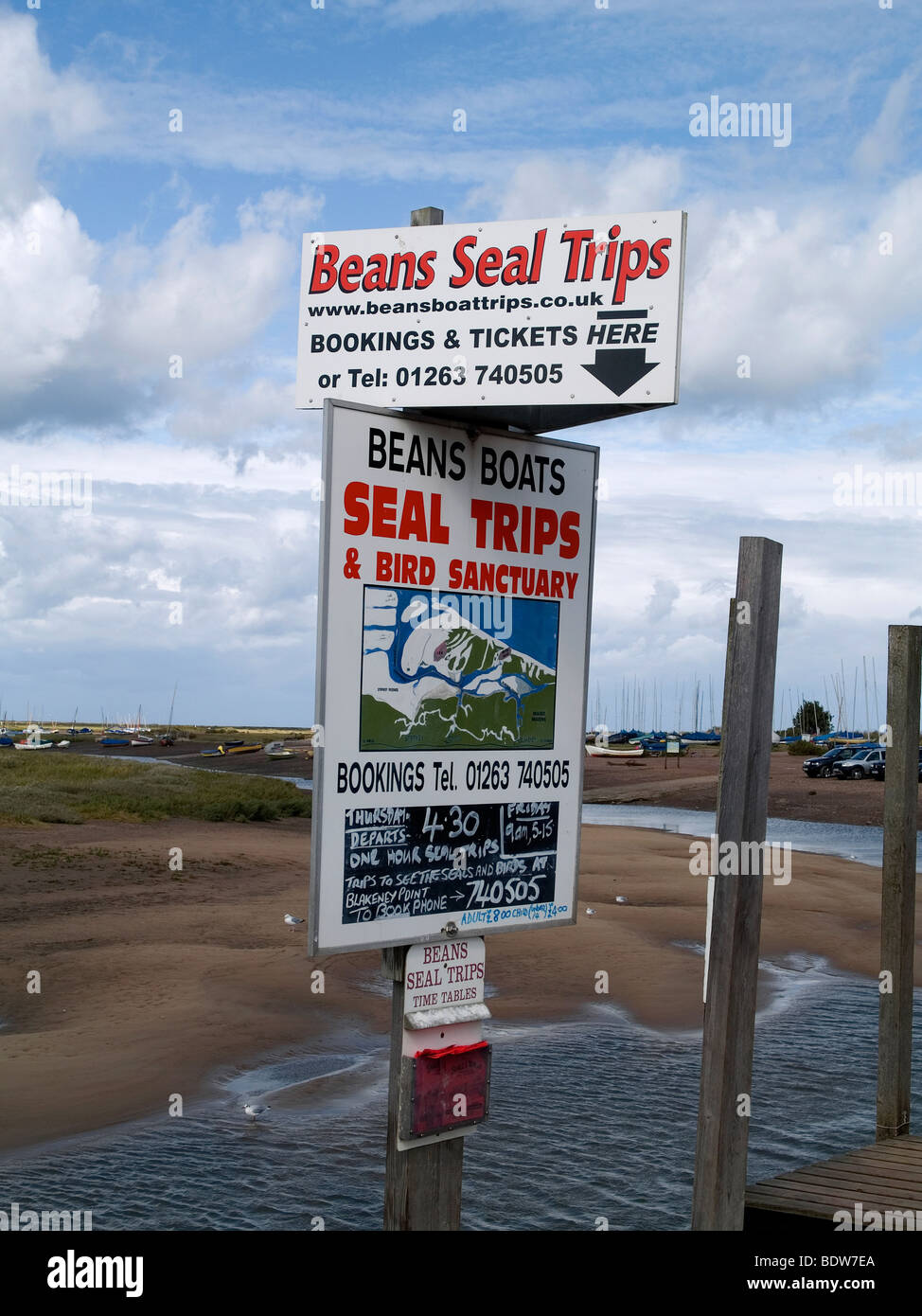 Sign advertising boat trips to view seals at Blakeney Norfolk Stock Photo