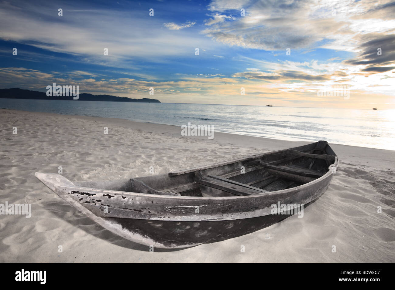 Old wooden boat on beach sunset hi-res stock photography and images - Alamy