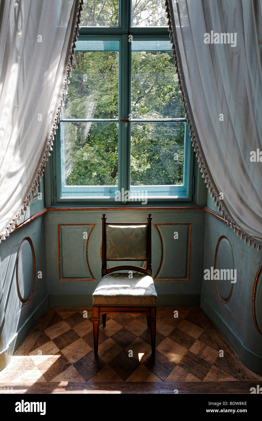 Interior design in the neoclassical style, paneled window alcove with curtains and chair, Schloss Elisabethenburg castle, Rhoen Stock Photo
