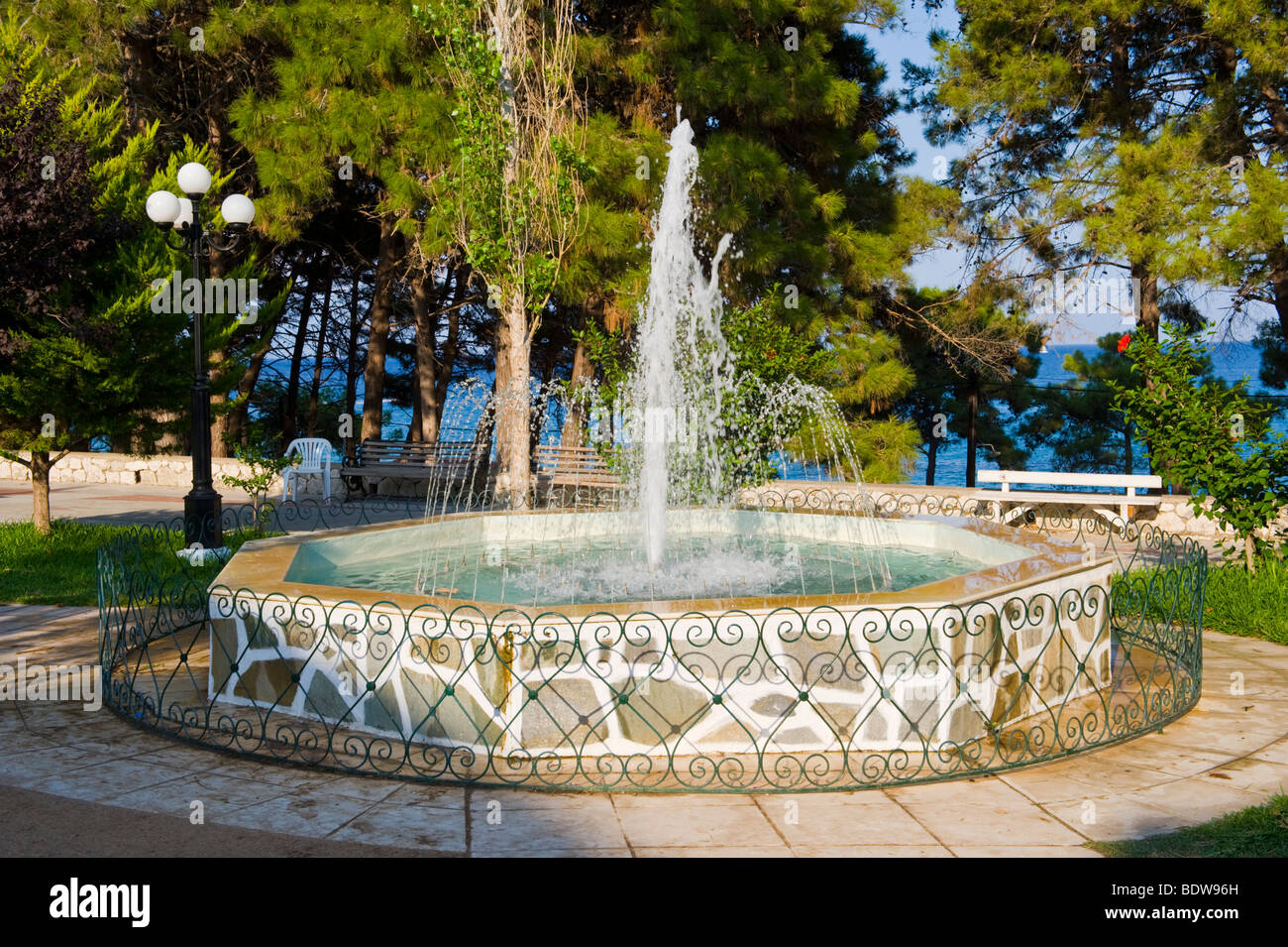 Water fountain in village public square at Skala on the Greek