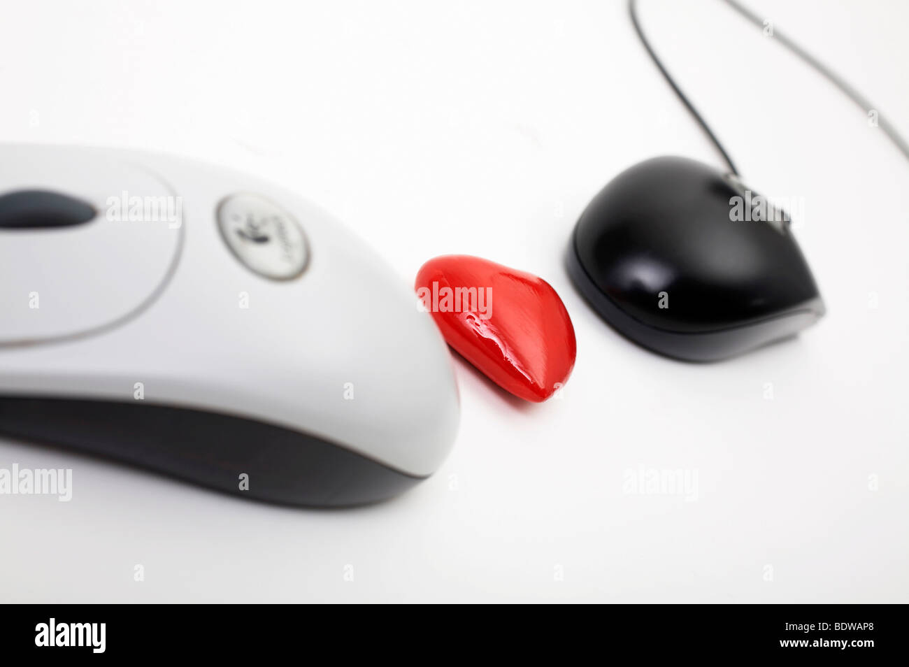 Heart with two computer mice, online dating Stock Photo