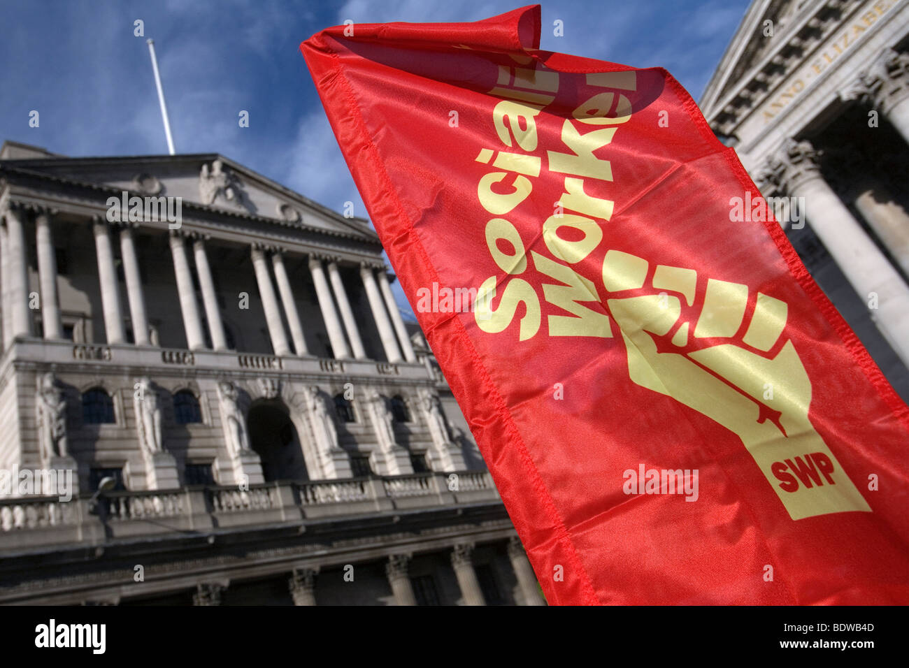a socialist workers party banner opposing the bank of england in london Stock Photo