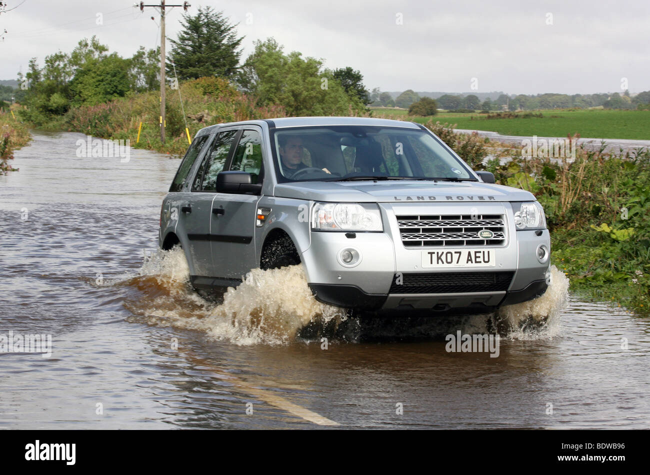 Land Rover Freelander 2 in flood water on roads near Aberdeen, Scotland, UK, after heavy rain Stock Photo
