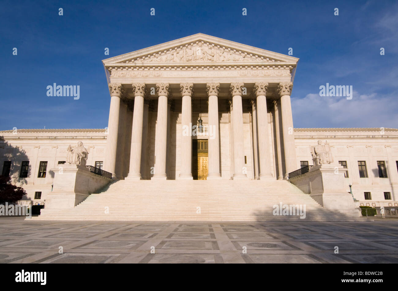 The steps of the United States Supreme Court building bathed in late afternoon sunlight. Stock Photo