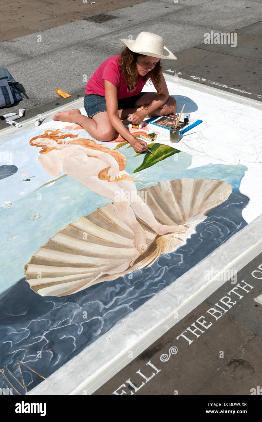 Pavement artist painting The Birth of Venus by Sandro Botticelli in Trafalgar Square, London, England, UK Stock Photo