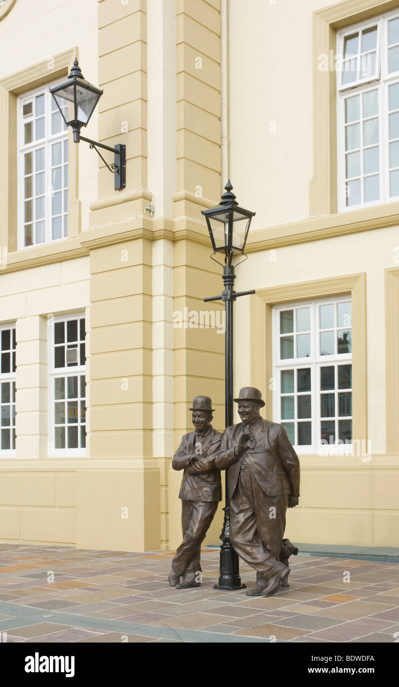 Statue of Stan Laurel and Oliver Hardy, outside Coronation Hall, Ulverston, Cumbria, England UK Stock Photo