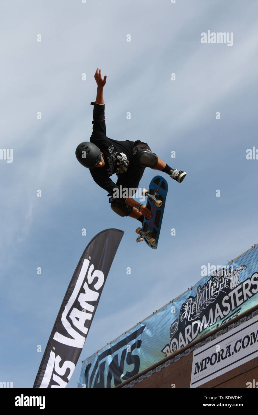 A Skateboard competitor in midair at Boardmasters Fistral Beach  Newquay England UK 2009. Stock Photo