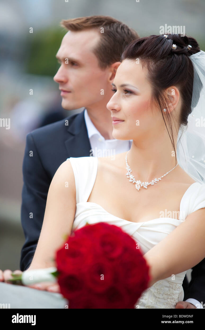 Young wedding couple portrait. Profile view Stock Photo - Alamy