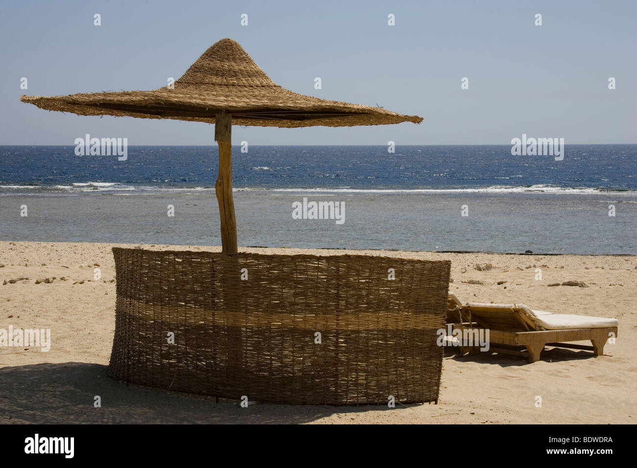 A parasol on the beach of the Red Sea at Marsa Alam, Egypt, Africa Stock Photo