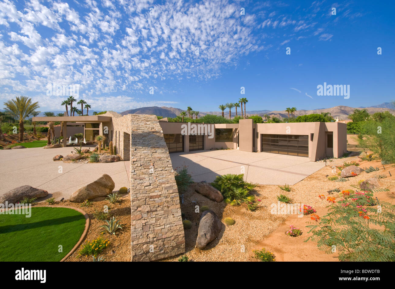 Dramatic contemporary private residence is shown from side Stock Photo