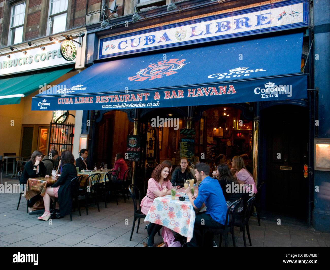 People eating out at Cuba Libre restaurant in Upper Street, Islington, London, England, UK Stock Photo