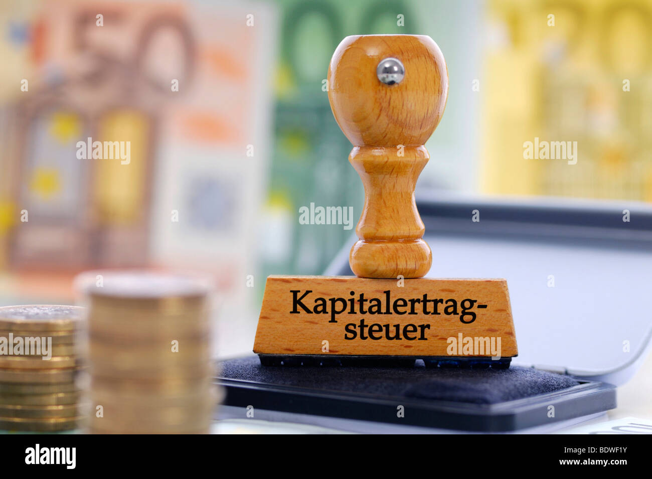 Stamp with the writing Kapitalertragsteuer capital yields tax Stock Photo