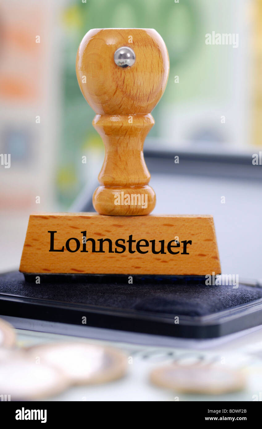 Stamp with the writing Lohnsteuer, German for income tax Stock Photo