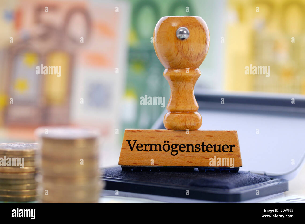 Stamp with the writing Vermoegensteuer, German for property tax Stock Photo