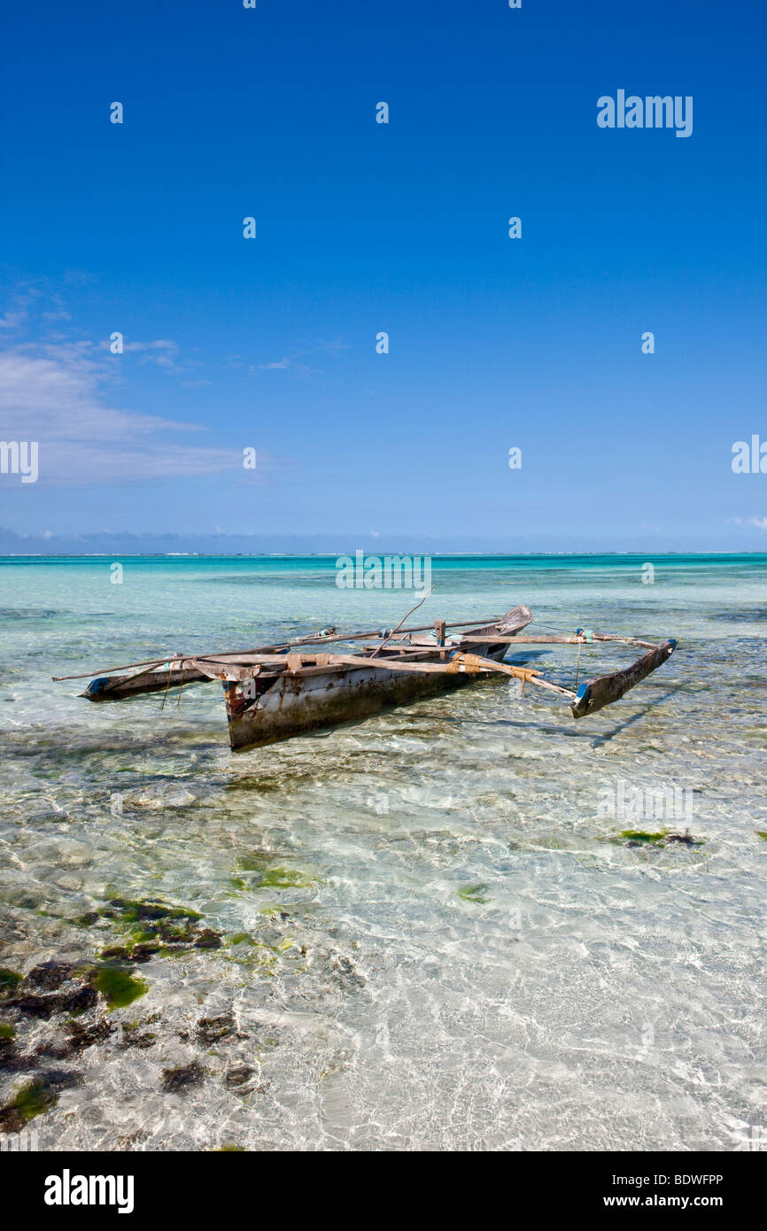 Native outrigger boat on the beach at Pingwe, Zanzibar, Tanzania, Africa Stock Photo