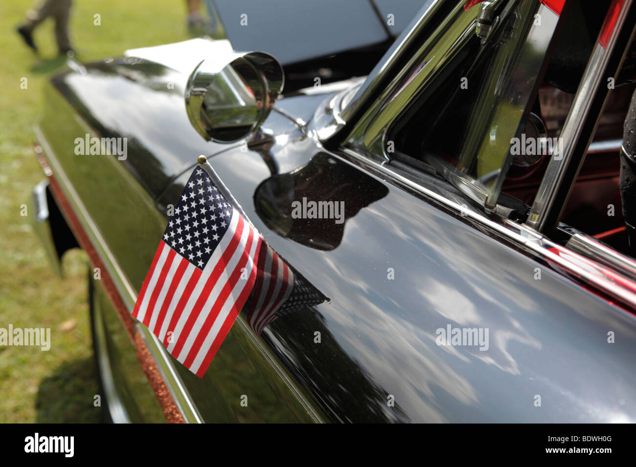 1964 Ford Galaxie 500. steering wheel and american flag. Smithville, Indiana car show. Stock Photo