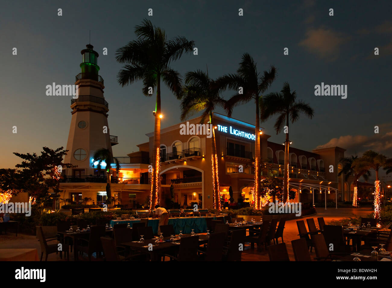 The Lighthouse Hotel, night, illuminated, fairy lights, restaurant, palm trees, romantic mood, Olongapo City, Subic Bay, Luzon  Stock Photo