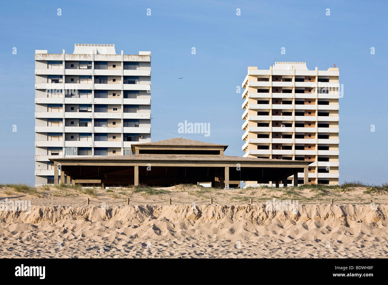 Architectural blunders, ruins, high-rise buildingd on the beach of Alvor, Algarve, Portugal, Europe Stock Photo