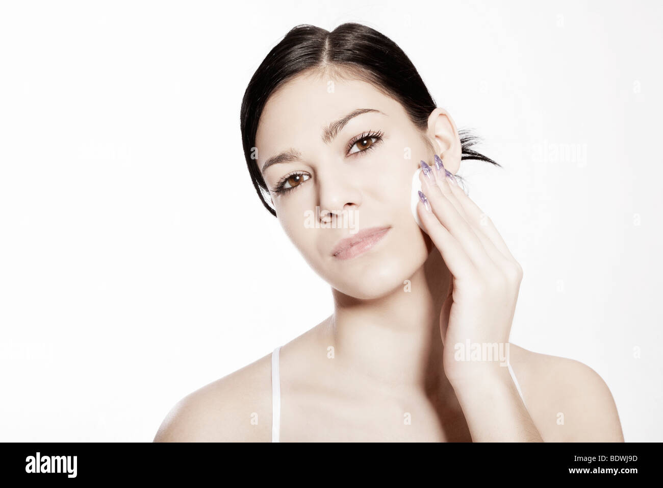 Black woman taking off face hi-res stock photography and images - Alamy