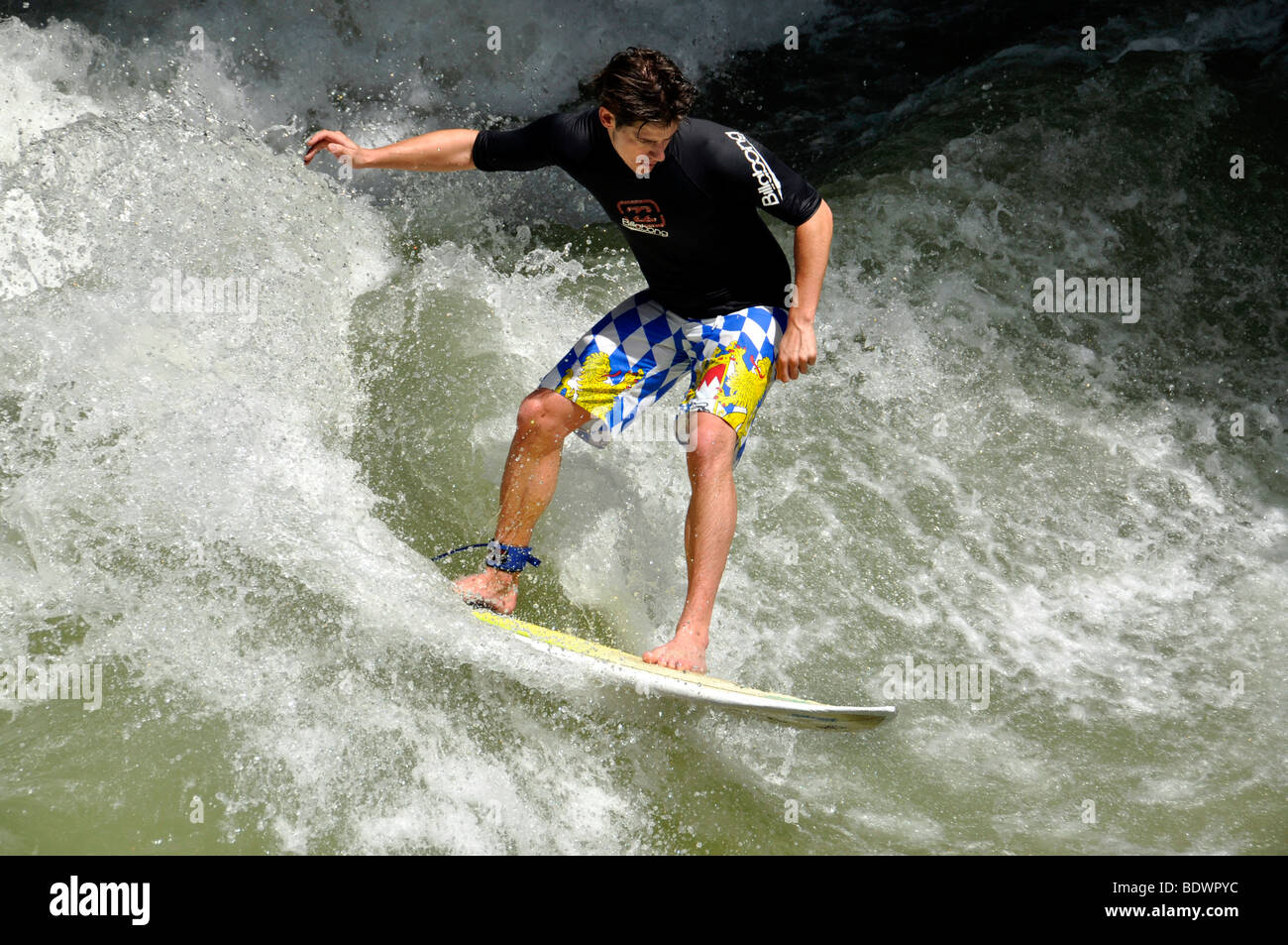 Surfer, Eisbach river, Englischer Garten English Garden, Munich, Upper Bavaria, Bavaria, Germany, Europe Stock Photo