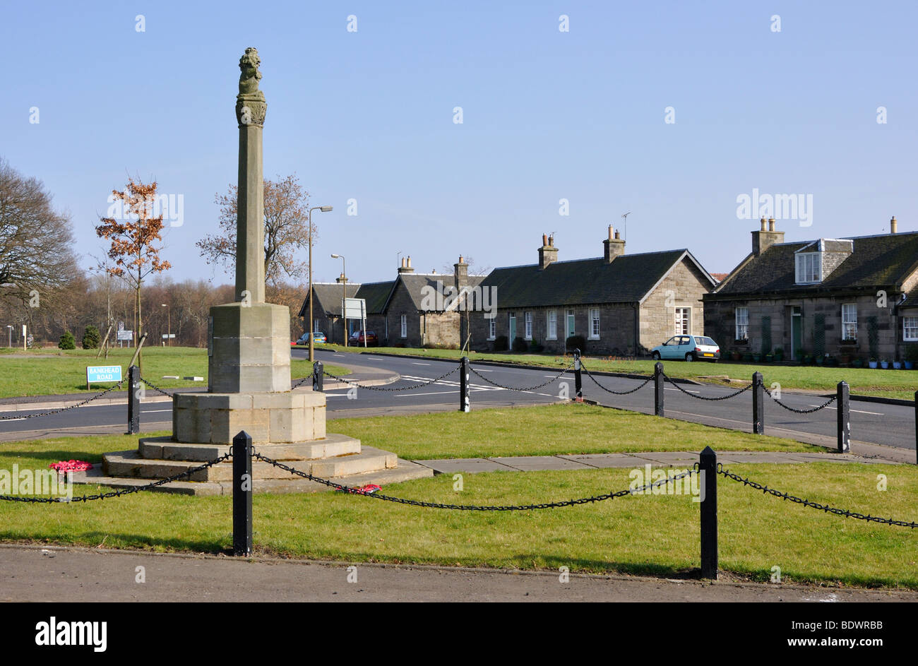Mercat Cross and War Memorial, Dalmeny, Scotland, UK. Stock Photo