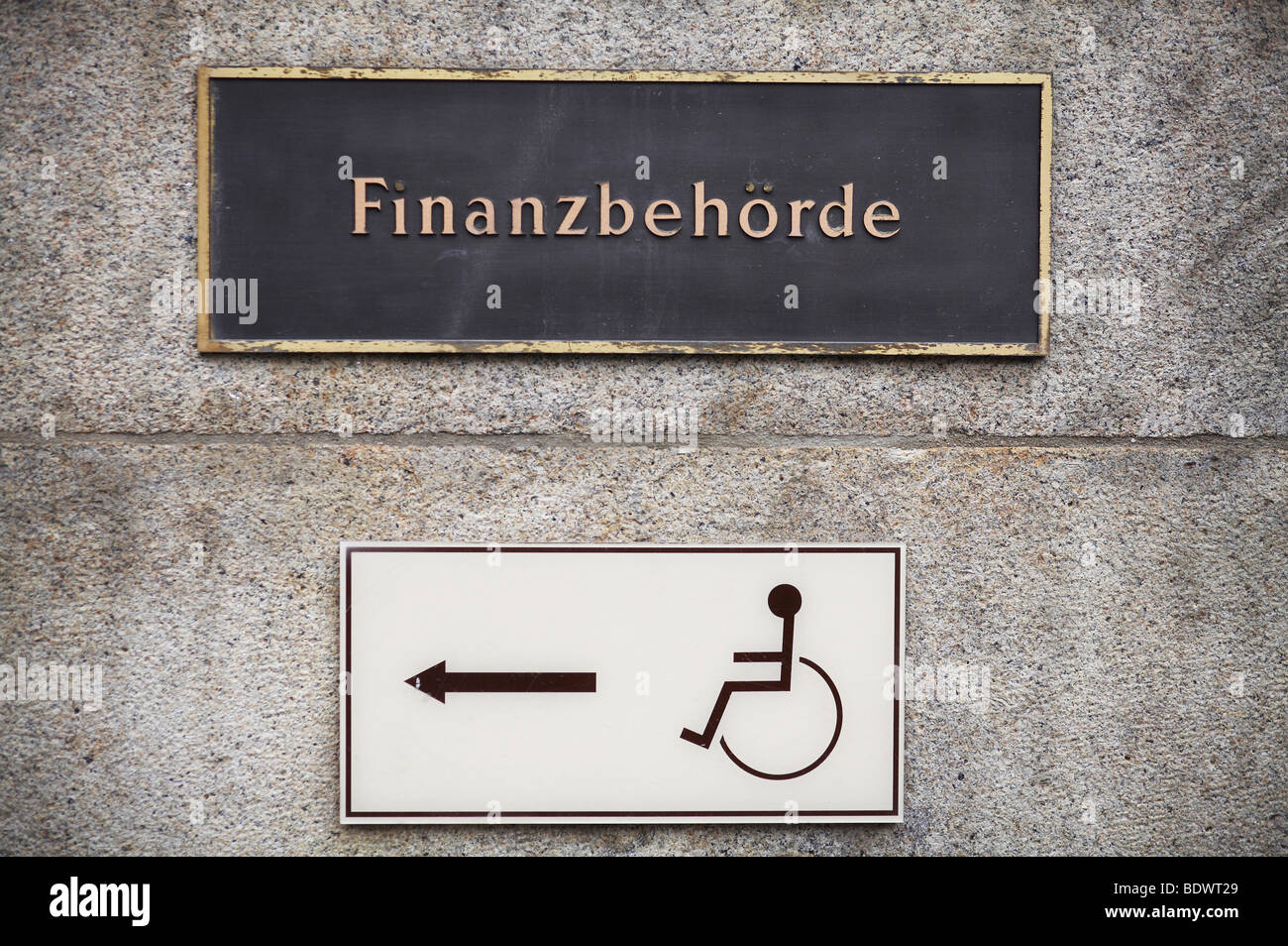 Sign, Finanzbehoerde, fiscal authority, below it sign for wheelchairs Stock Photo