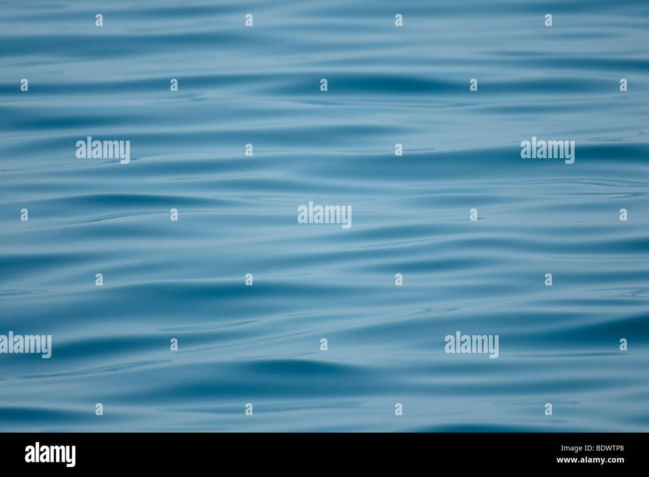 Patterns in rippled sea surface on a calm day. Stock Photo