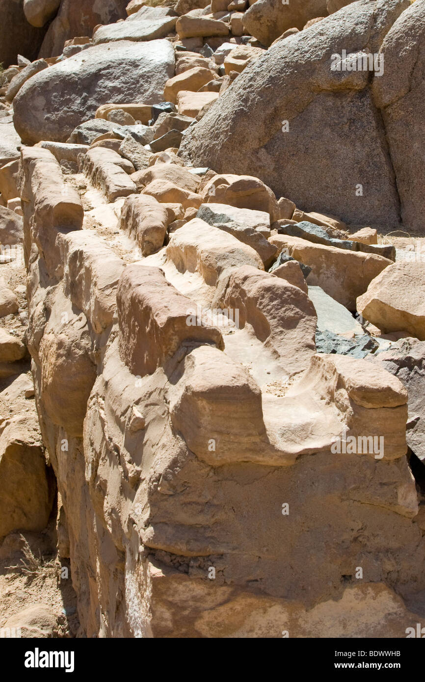 Nabataean Chanel Ruins near Lawrences Spring or Ain Shalaaleh in Wadi Rum in Jordan Stock Photo