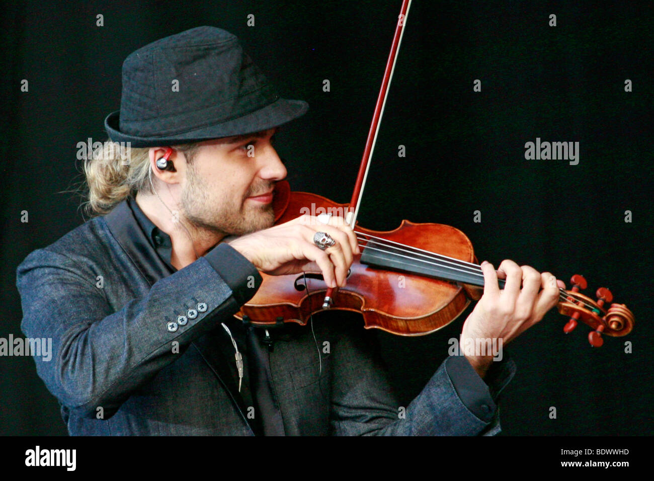 Star violinist David Garrett in an open-air performance at the movie nights at the bank of the river Elbe in Dresden, Saxony, G Stock Photo