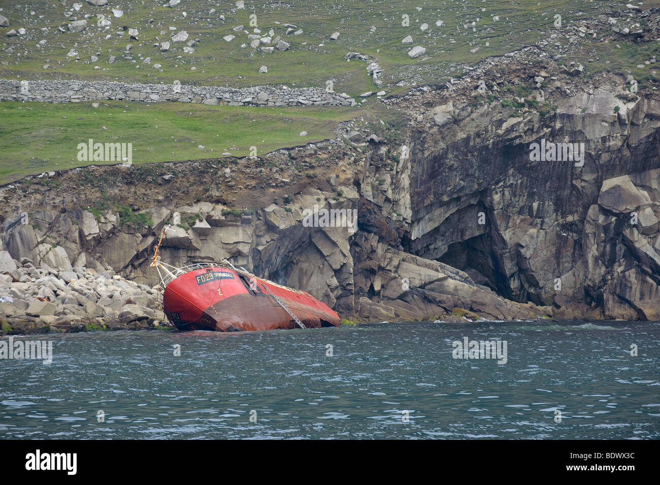 Wreck of the Spinningdale aground on island of Hirta in the Saint Kilda archipelago, Scotland. June 2009. Stock Photo