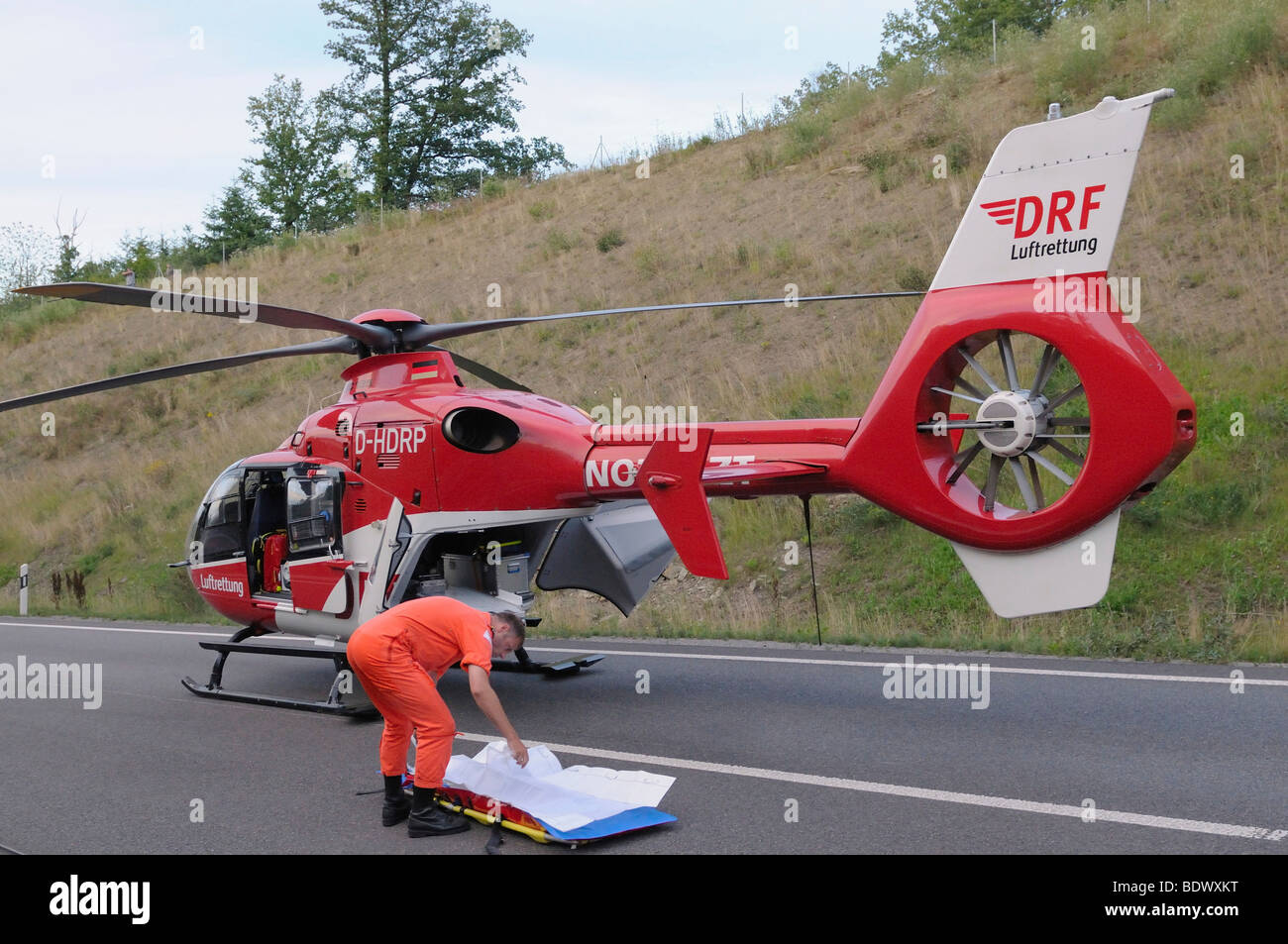 Rescue helicopter at a serious motorcycle accident on the Bundesstrasse B 295 highway between Leonberg and Renningen, Baden-Wue Stock Photo
