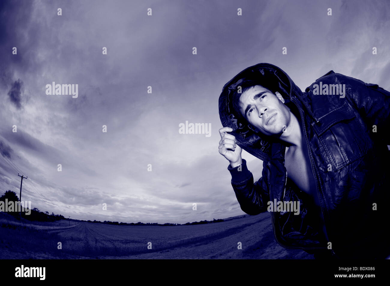 Young black male model posing hi-res stock photography and images - Alamy