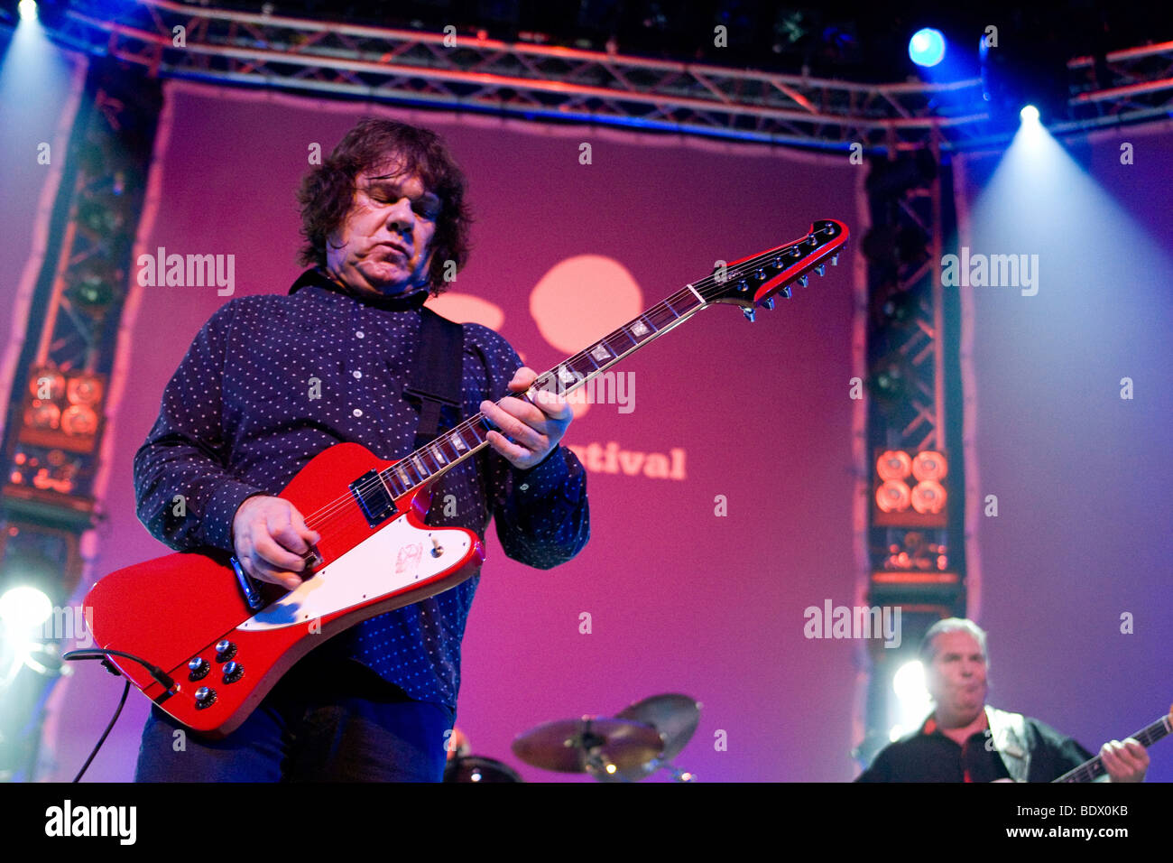 Irish Blues Rock musician Gary Moore performing live at the Blue Balls