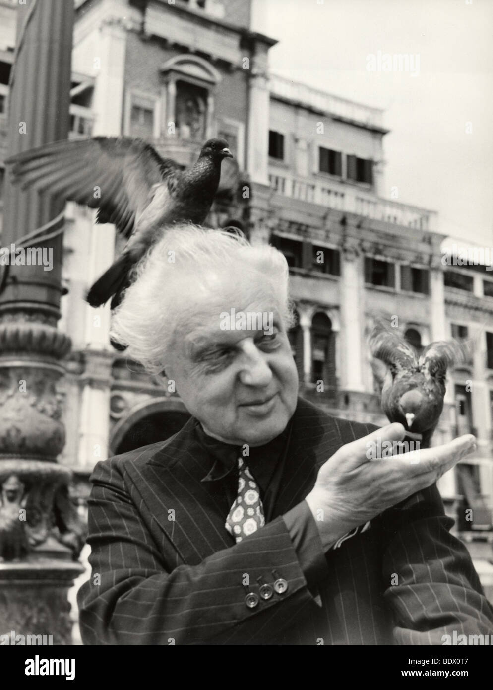 LEOPOLD STOKOWSKI  - US classical music conductor (1882-1977) on a visit to St Marks Square, Venice about 1960 Stock Photo