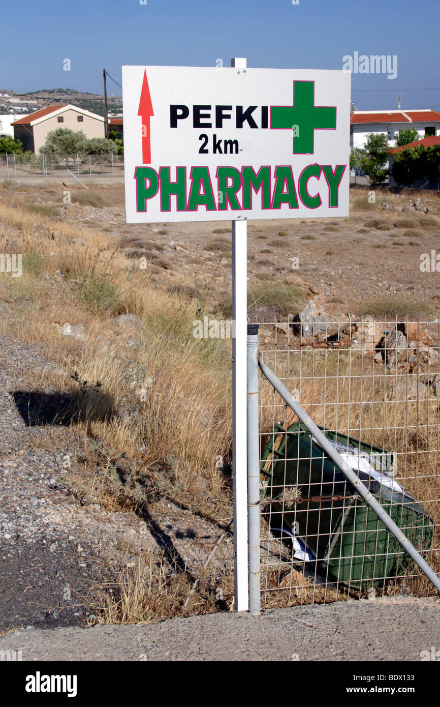 Pefki Pharmacy sign post , Rhodes , Dodecanese , Greece Stock Photo