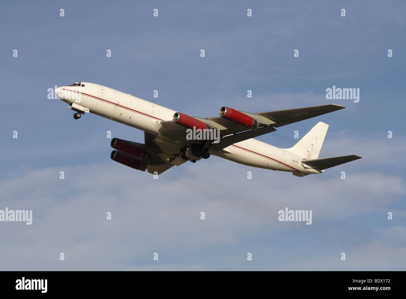 Air Charter Express DC-8 cargo jet climbing on departure Stock Photo
