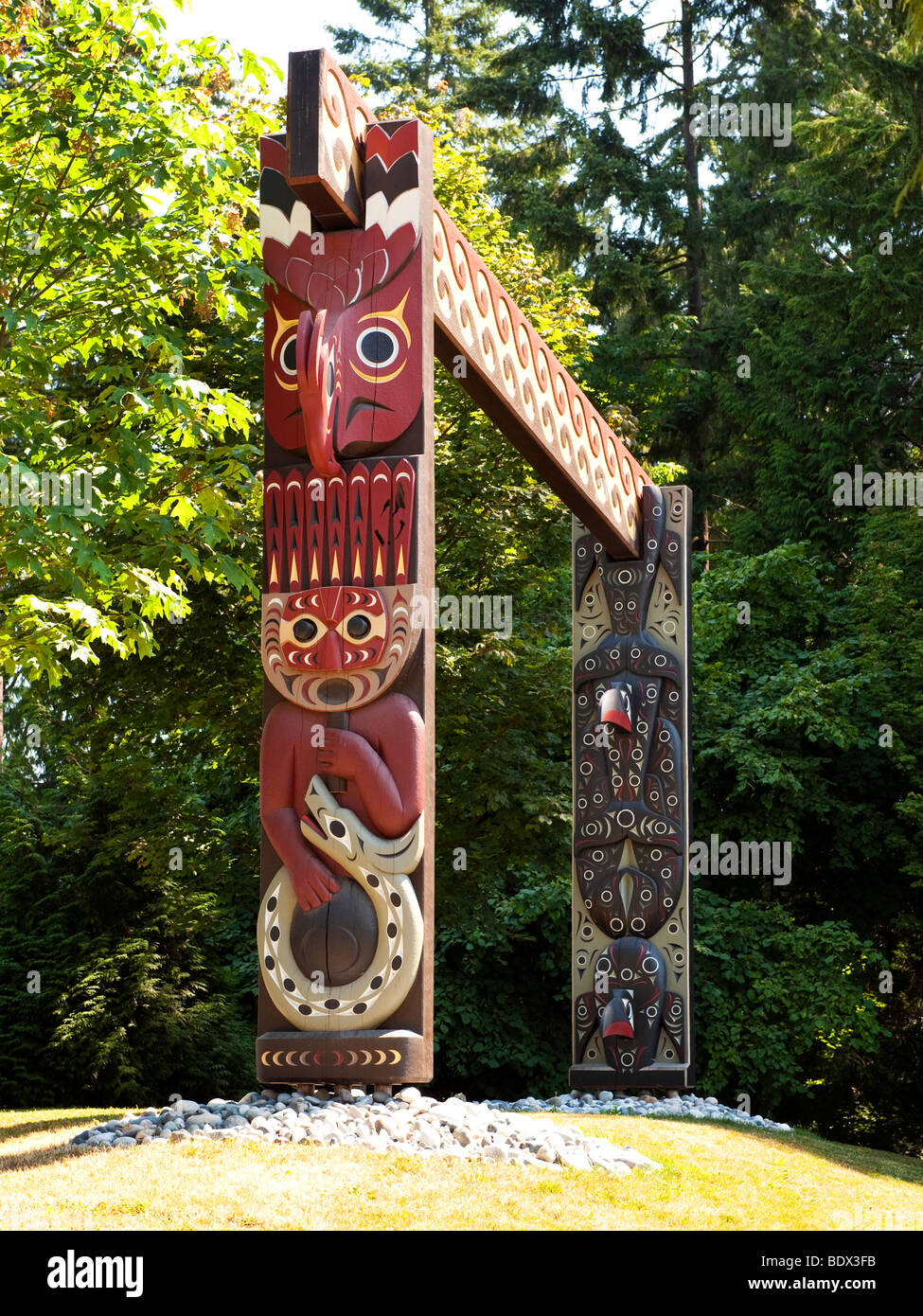 Coast Salish Welcome Gate, carved by Susan Point, at totem pole display area in Stanley Park, Vancouver, BC, Canada. Stock Photo