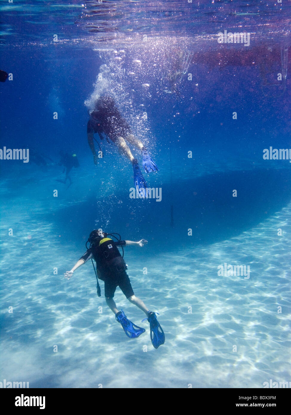 Scuba diving tourists at the Blue Lagoon, Cape Greco, Cyprus. This is