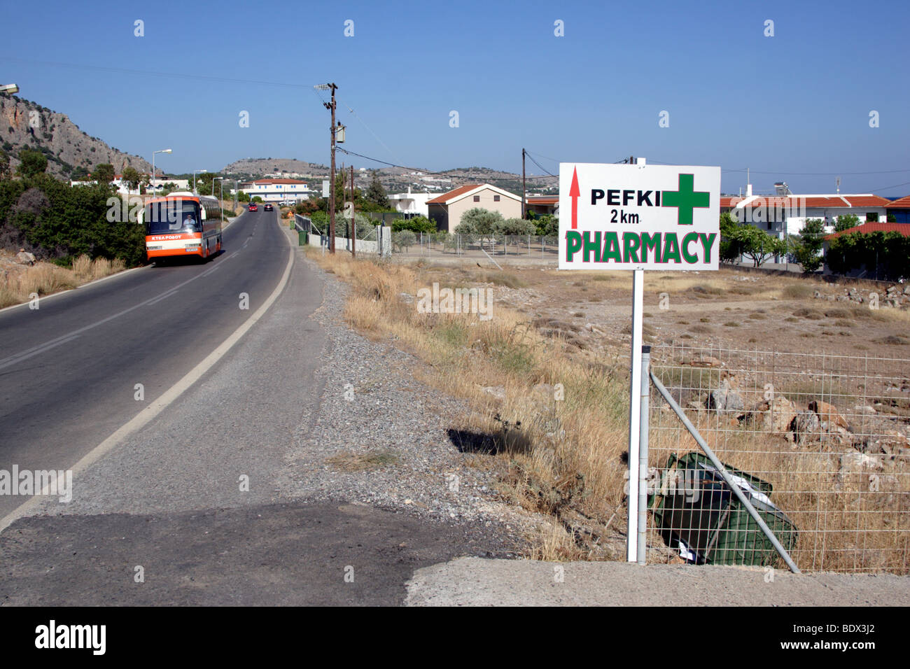 Pefki Pharmacy sign post , Rhodes , Dodecanese , Greece Stock Photo